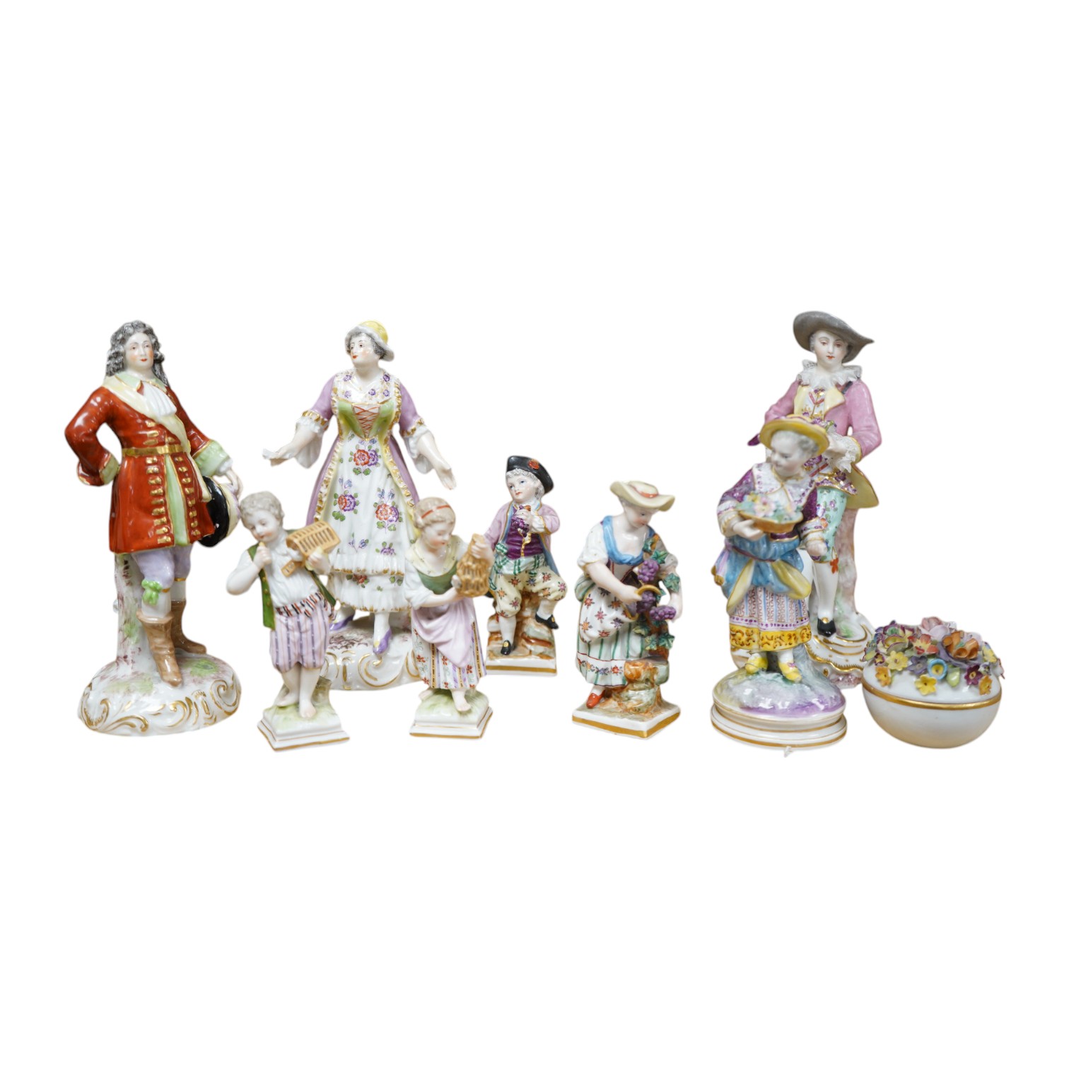 Eight various German porcelain figures, some with crossed sword marks to the bases and a floral encrusted pot and cover, largest 19cm high. Condition - fair, some losses